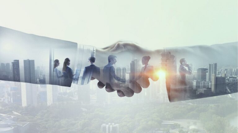 Shaking hands Image of employees in City Partnership between Deloitte Belgium and Billtrust