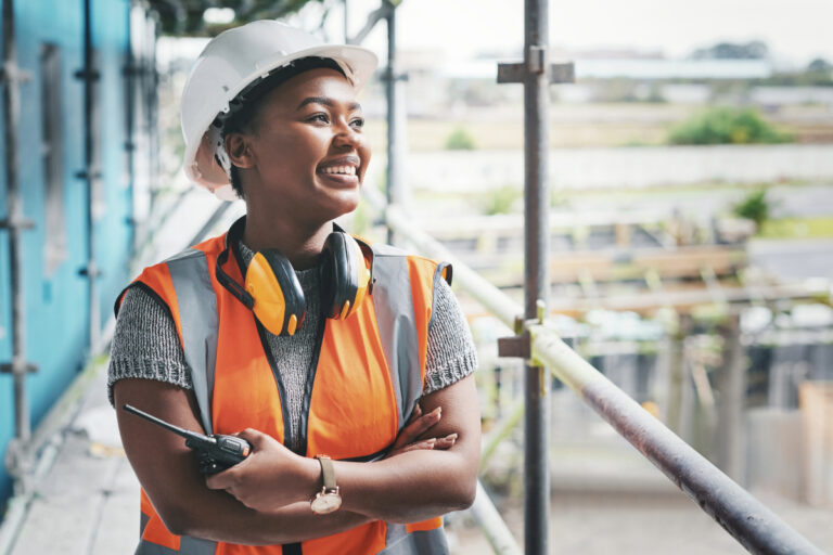 Construction worker standing on scaffolding