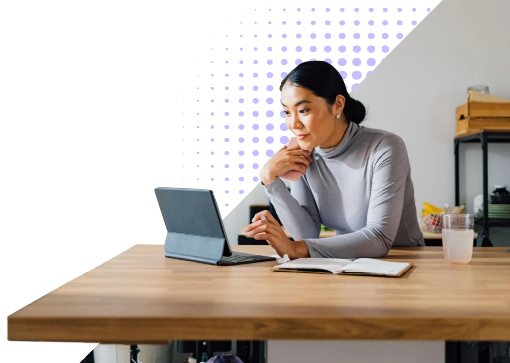 A person works on a laptop