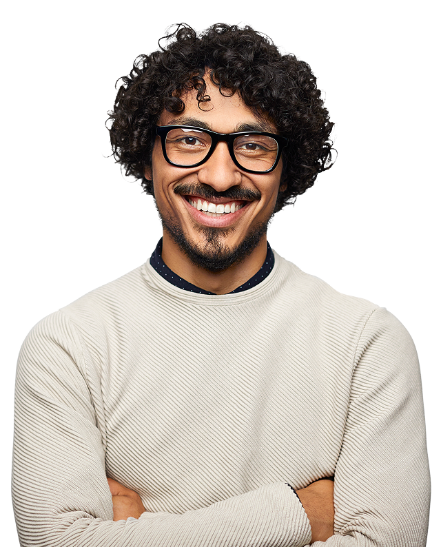 Man with curly hair and glasses smiling