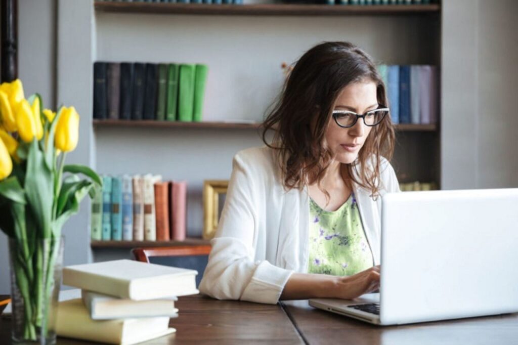 woman in her office using a laptop