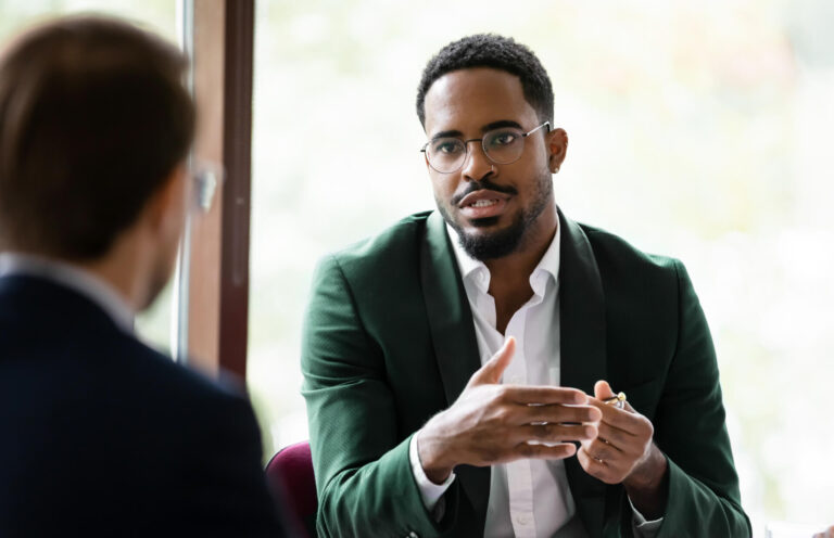 Two men in deep discussion