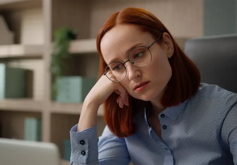 unmotivated woman bored with computer