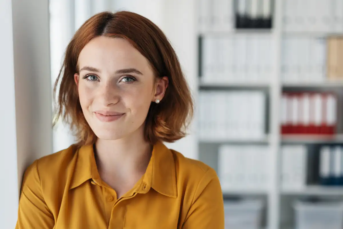 confident professional in a storage room