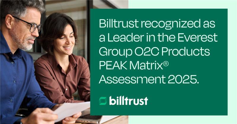 Man and woman looking at computer reading Billtrust press release