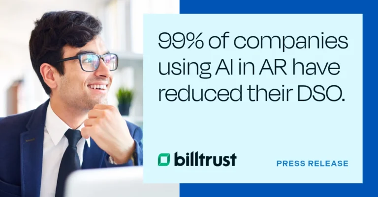 Man Smiling at Computer - 99% of Companies using AI in AR have reduced their DSO