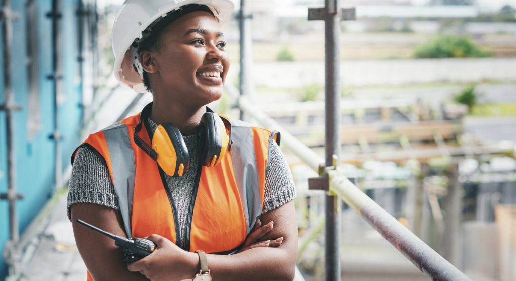 Construction worker standing on scaffolding