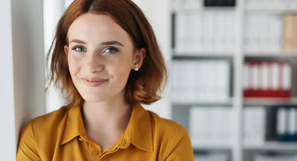confident professional in a storage room