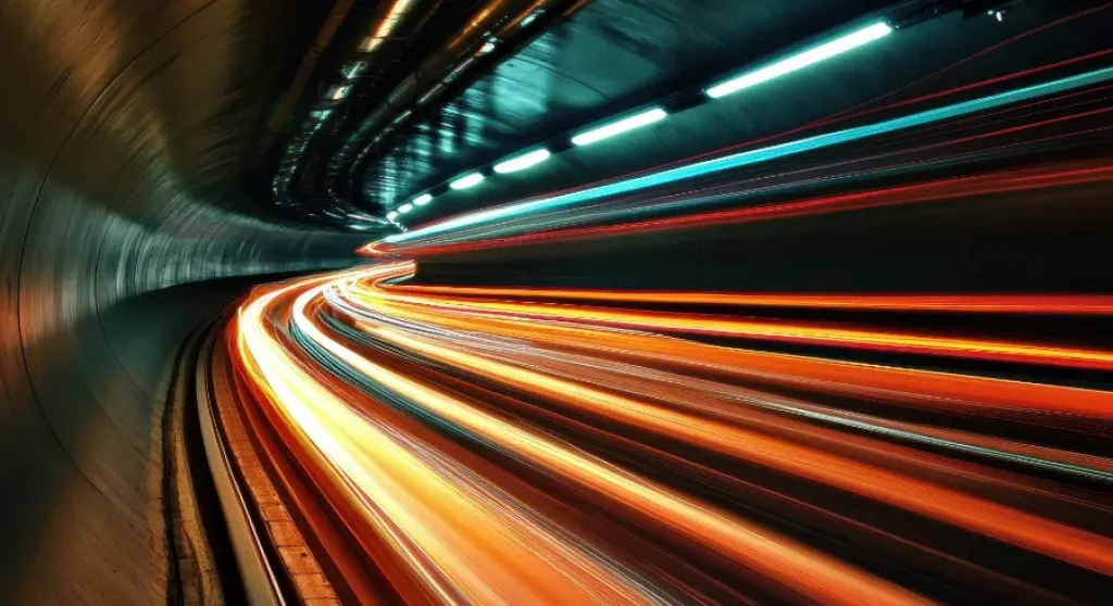 lights speeding through train tunnel