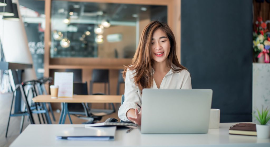 Young professional using laptop