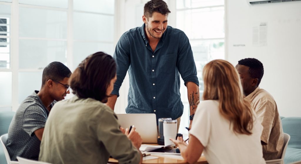 Manager leading a team meeting